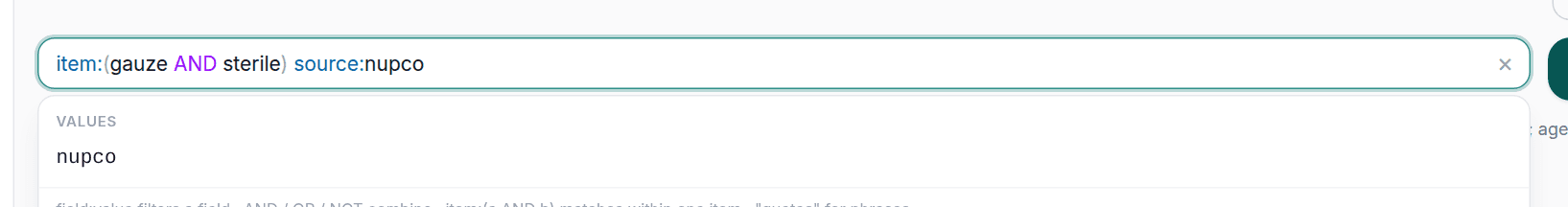 The search bar holding a structured query with coloured parts and suggestions underneath